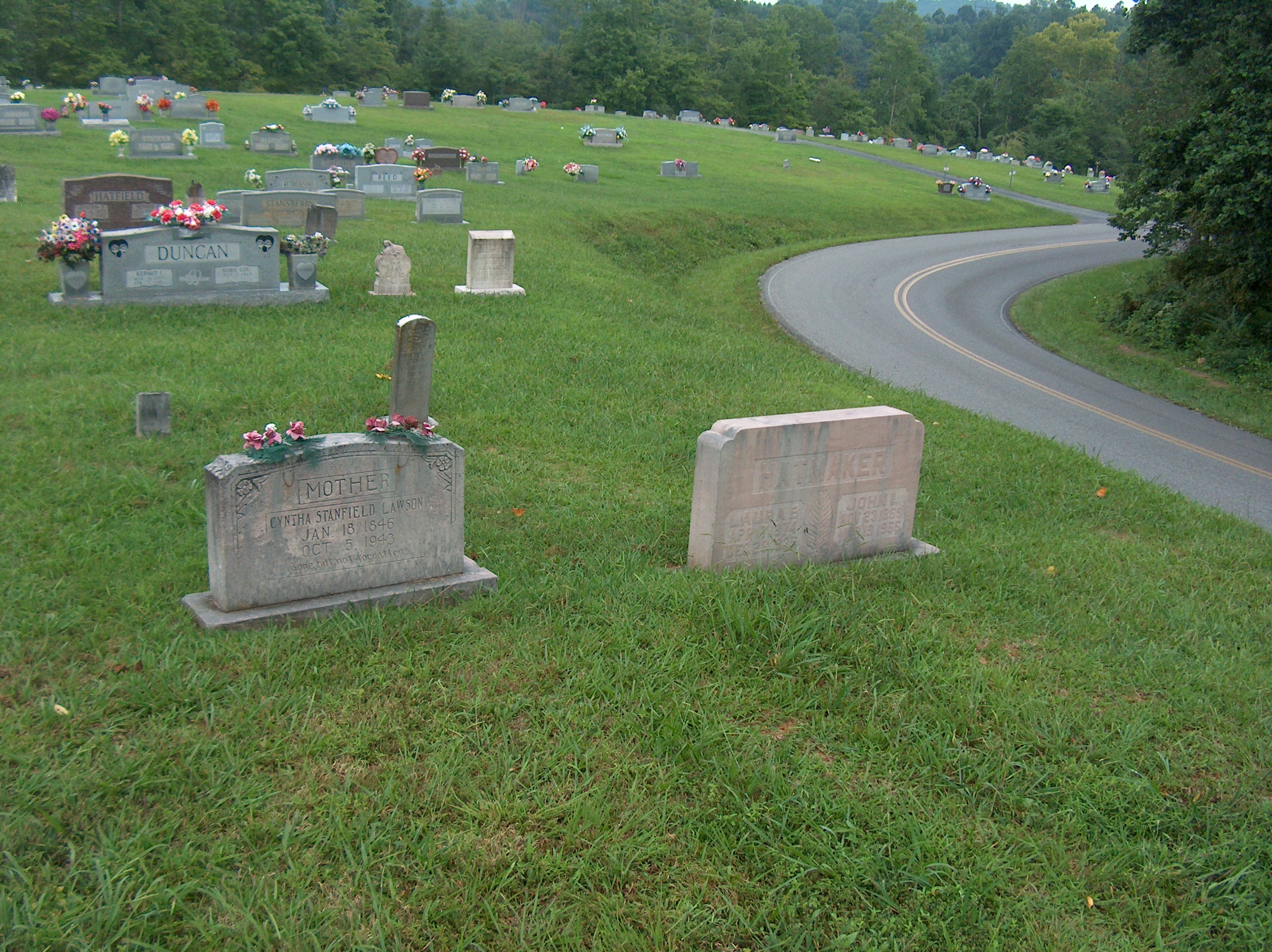 Sometimes family members are buried near each other. In this case, Cyntha is Laura's mother.